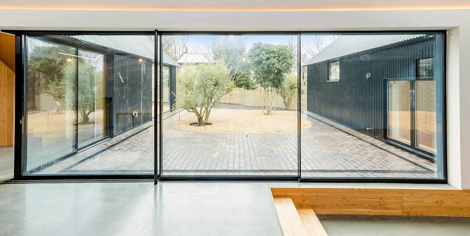 a large open room with a wooden bench
